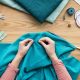 why you should learn to sew woman sewing
